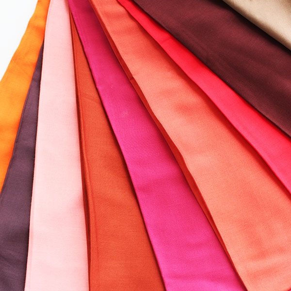 Why Rayon Plain Dyed Fabrics Are a Top Choice for Apparel Manufacturers Worldwide